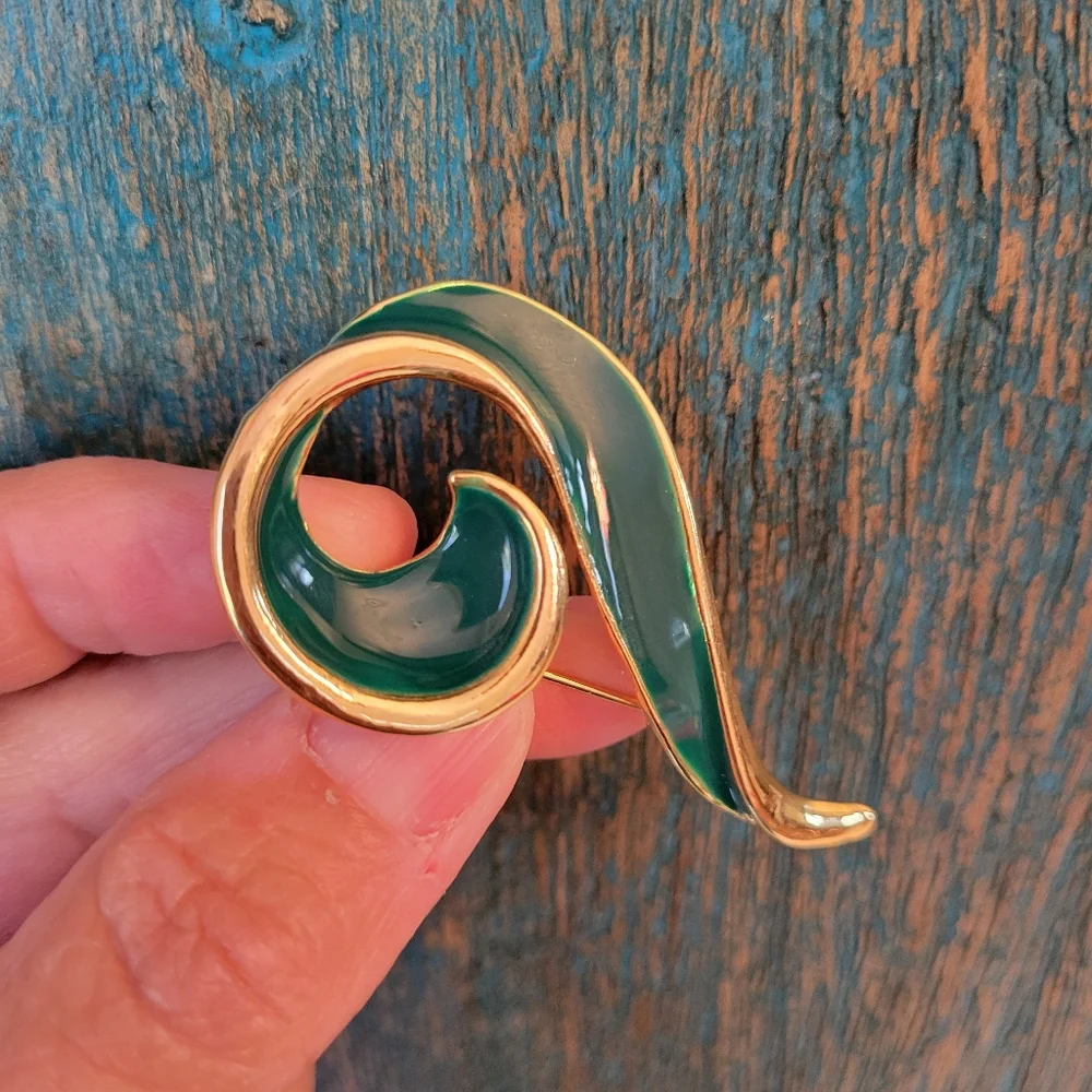 Trifari trio brooches